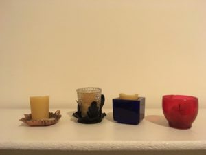 Four votive candle holders: described in surrounding text.