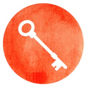 Concepts : white key at an angle on orange red circle.