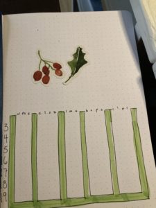 Planner page with stickers (holly berries and leaf) in the top half, and columns in the bottom for time tallying.